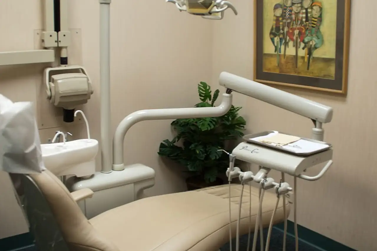 A treatment room at North Shore Dental in Evanston, with a framed print above the chair.